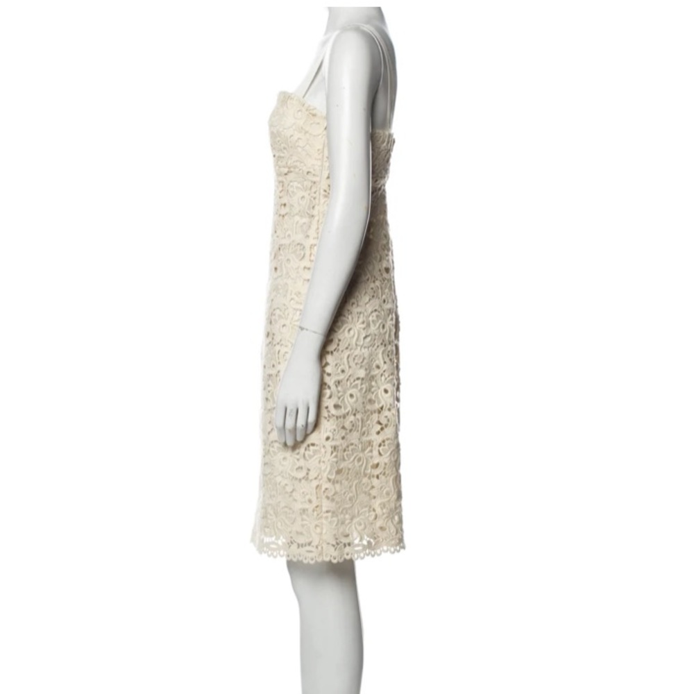 Ivory lace dress by Michael Kors is in like new condition. Size 2 - Picture 3 of 16